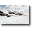 The Rennick Glacier in Northern Victoria Land, with our snowmobiles and sleds in the foreground. (PAM)